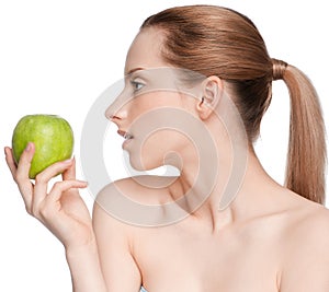Woman eat green apple