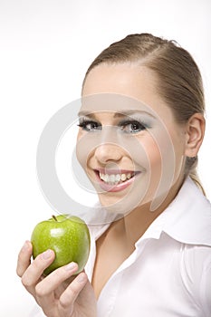 Woman eat green apple