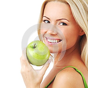 Woman eat green apple