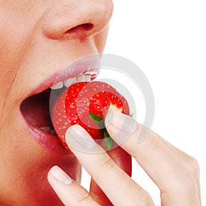 Woman eat strawberry