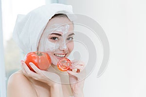 Woman Eat Tomato healthy spa skin care concept