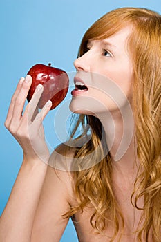 Woman eating apple