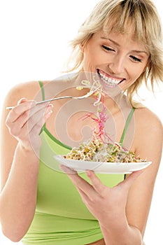 Woman eating bean sprouts