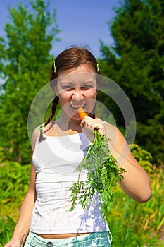 Woman eating Carrot