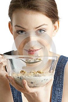 Woman eating cereals