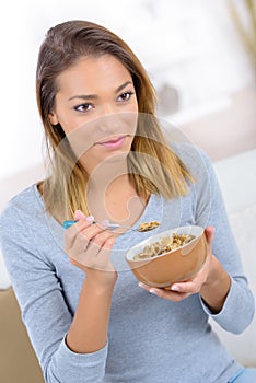 woman eating cereals