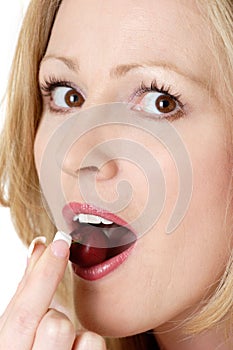 woman eating a cherry