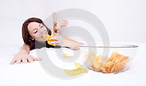 Woman eating chips