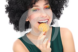 Woman eating cookie