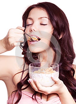 Woman eating cornflakes