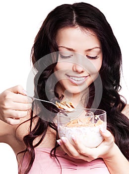 Woman eating cornflakes