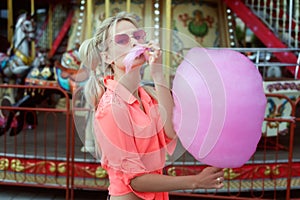 Woman eating cotton candy