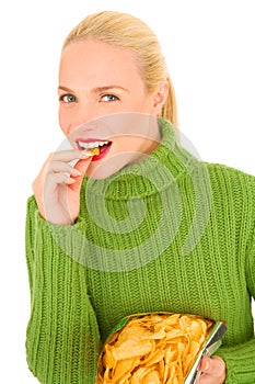 Woman eating crisps