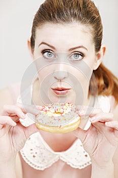 Woman eating a doughnut