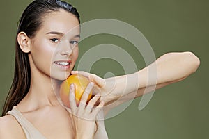 woman eating grapefruit in hands smile vitamins diet isolated background