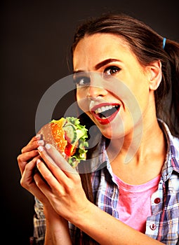 Woman eating hamburger. Girl wants to eat burger.