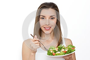 Woman eating healthy food, Caesar salad