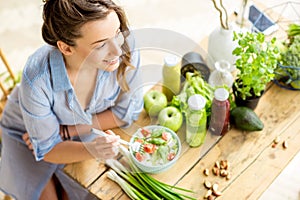 Woman eating healthy salad