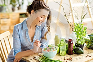 Woman eating healthy salad