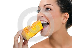Woman eating a macrobiotic pie photo