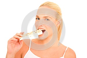 Woman eating nougat photo