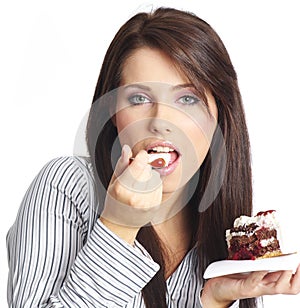 Woman eating piece of cake.