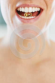 Woman eating pill