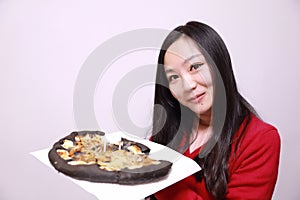 Woman eating pizza