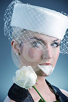 Woman eating rose petal