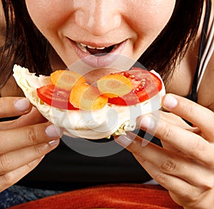 Woman eating a sandwich