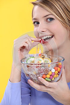 Woman eating sweets