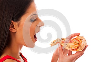 Woman eating tasty piece of pizza. Unhealthy fast food meal.