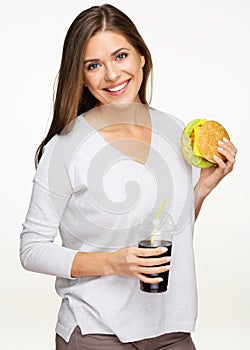 Woman eating unhealthy meal, fast food. Burger