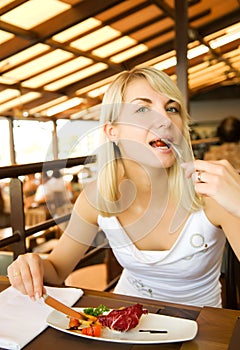 Woman eating vegetarian food