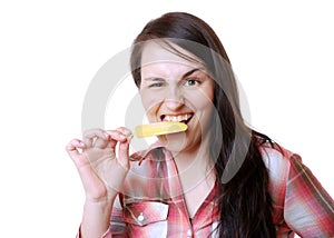 Woman eats a popsicle
