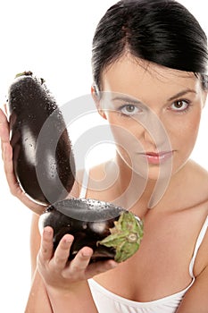 Woman with eggplants photo