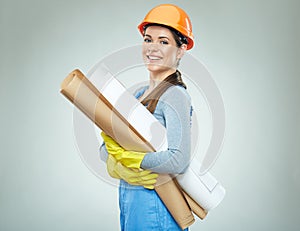 Woman egineer isolated portrait with paper plan. photo