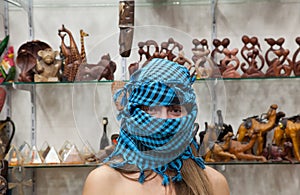 Woman in egyptian souvenirs shop