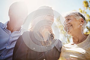 Woman, elderly parents and garden for sunshine lens flare, bonding or relax together in summer. Happy family, mother and