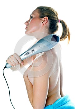 Woman with electric massager photo