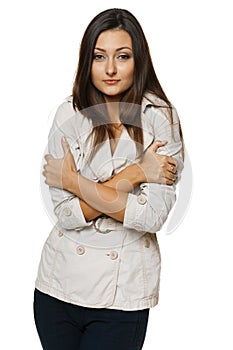 Woman embrace herself and shiver with cold