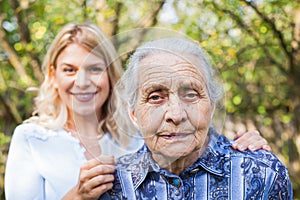 Woman embracing grandma