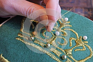 Woman embroidery craft at home