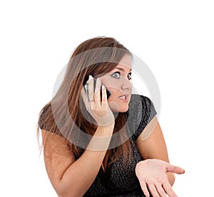 Woman emotionally speaks on the phone, isolated.