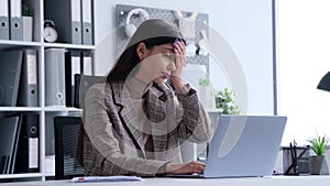 Woman Employee Facepalming During Work In Office