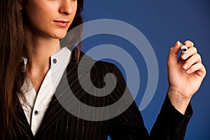 Woman encourage team by writting a success plan on transparent screen