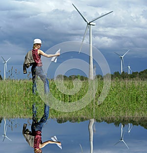 Woman engineer or architect with white safety hat