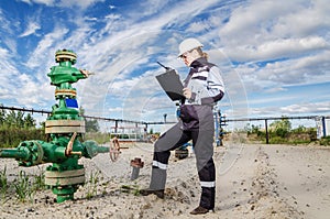 Woman engineer in the oilfield