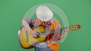 Woman Engineer Playing The Guitar