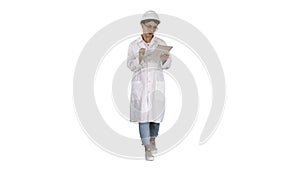 Woman engineer working on tablet on white background.